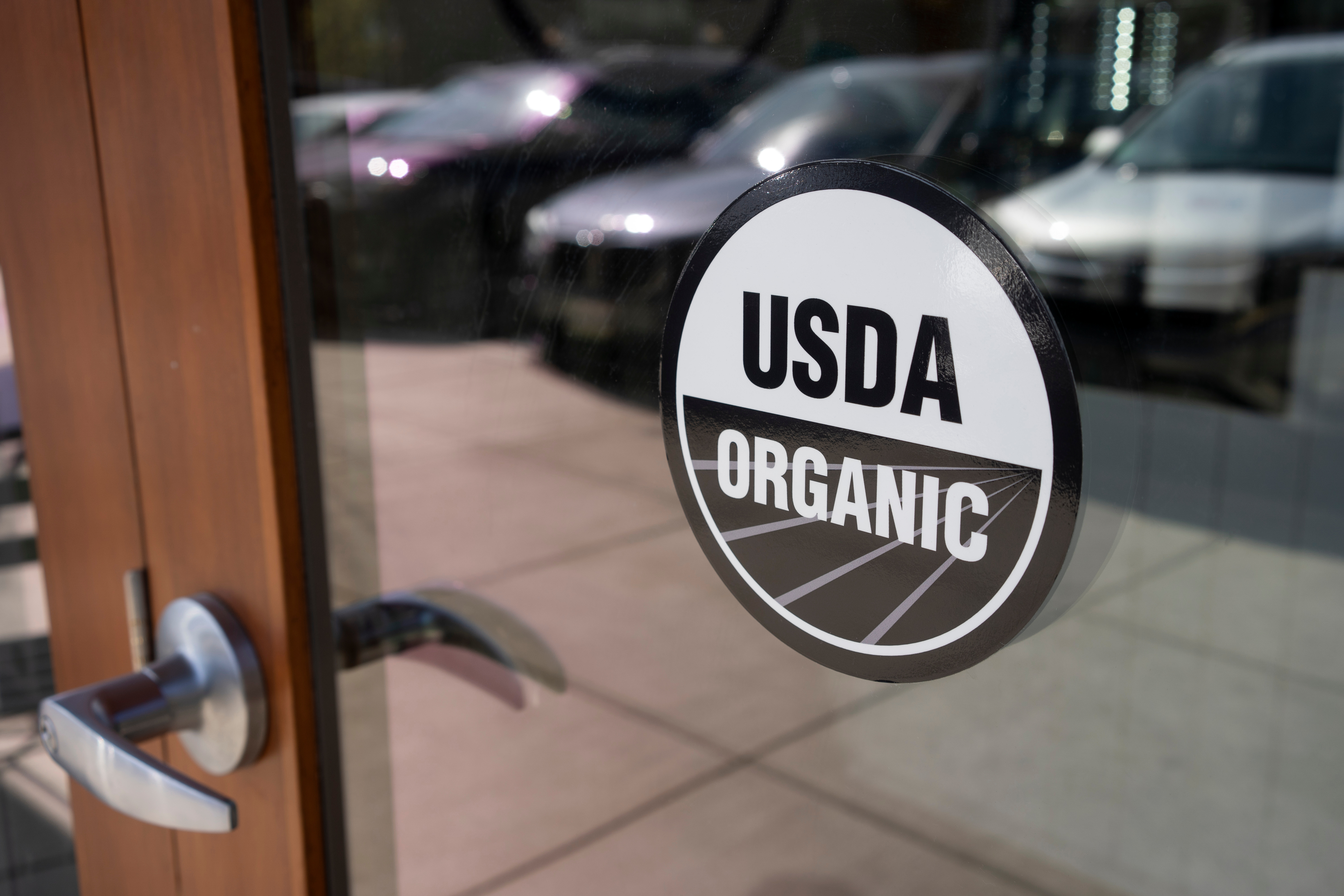 USDA black and white Organic label on door.